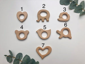 Kinderwagenkette und Holzrassel